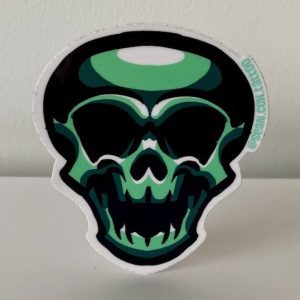 Green logo-style skull sticker front view