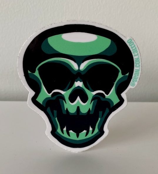 green-skull-sticker-tattoo-vancouver Green logo-style skull sticker front view