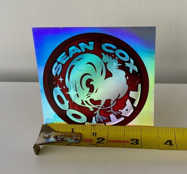 sparkle-rooster-size-sticker-tattoo-vancouver Holographic rooster logo sticker with tape measure
