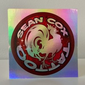 Holographic rooster logo sticker front view