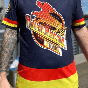 This T-shirt was modelled after the Vancouver Canucks 90’s spaghetti skate jersey. The number 14 is for the year 2014 when the shop first opened. Front view.