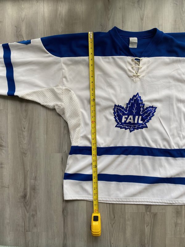 White and blue hockey jersey with “FAIL” maple leaf logo.