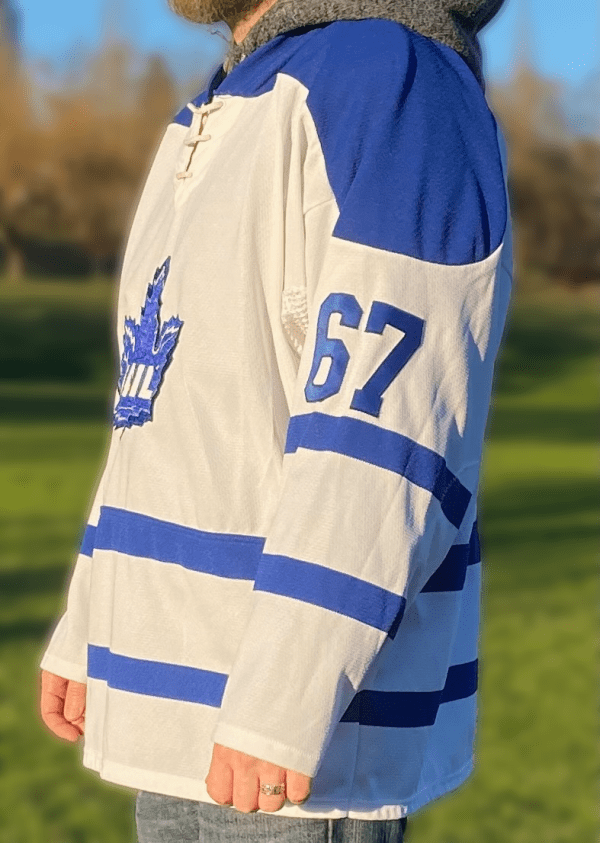 White and blue hockey jersey with “FAIL” maple leaf logo.