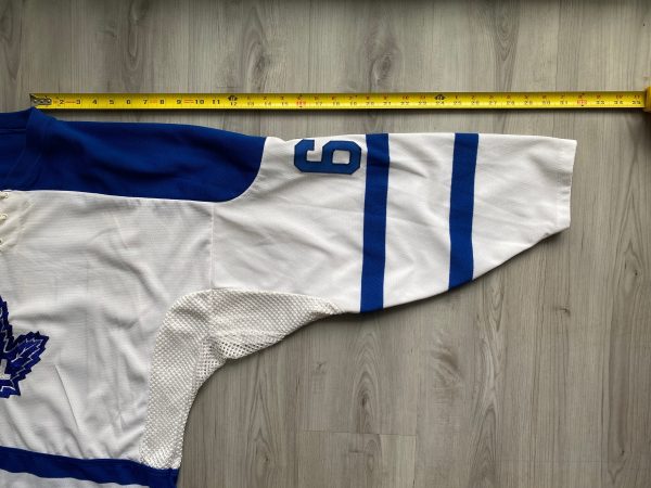 White and blue hockey jersey with “FAIL” maple leaf logo.