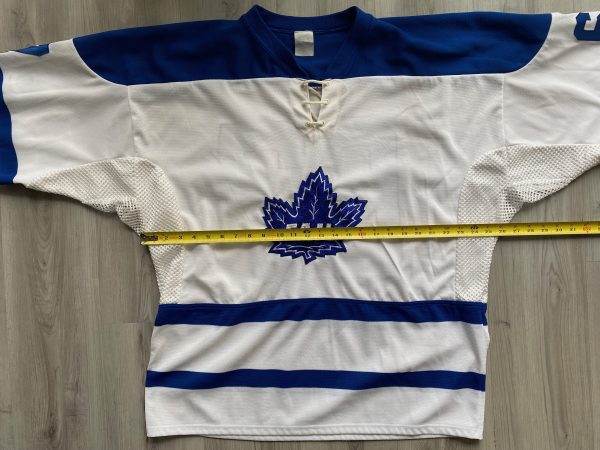 White and blue hockey jersey with “FAIL” maple leaf logo.