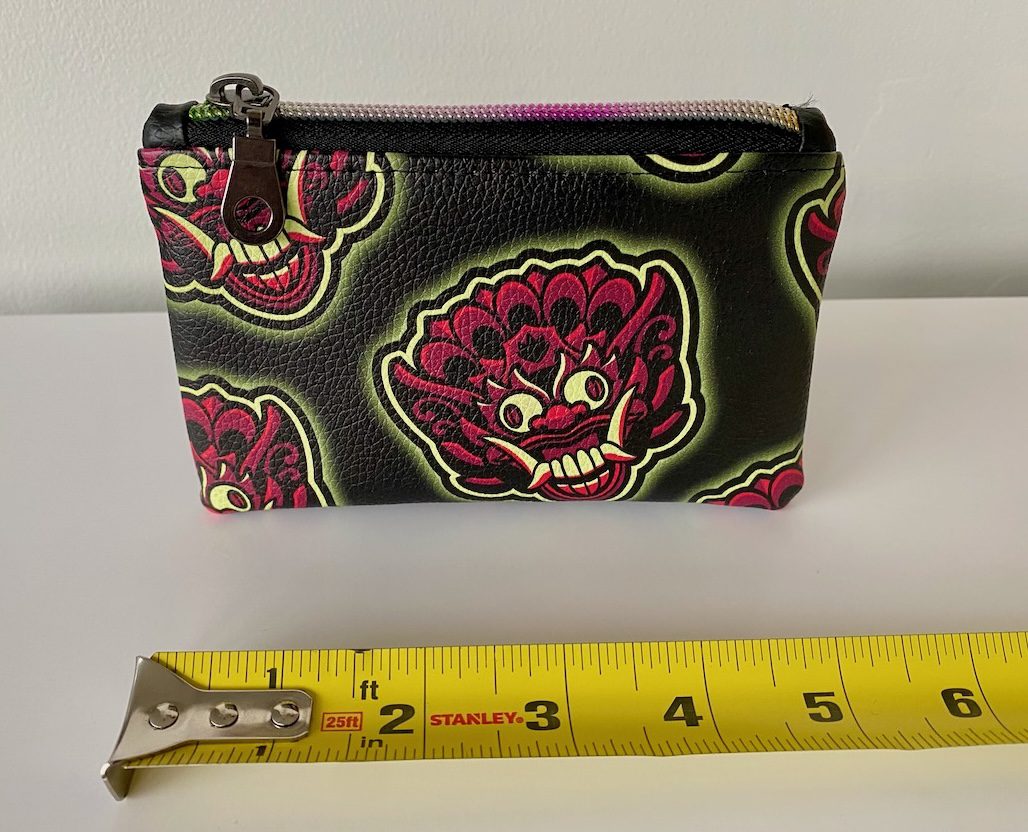 bali-mask-stash-bag-tattoo-new-westminster-size Bali Mask stash bag front with size tape measure