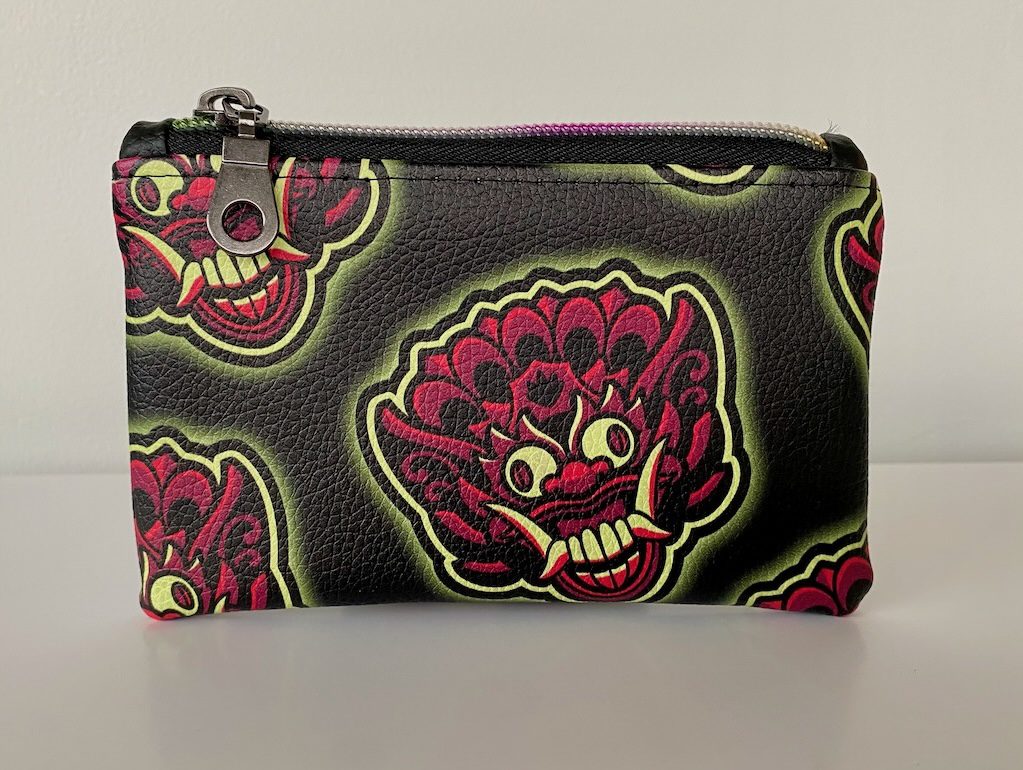 bali-mask-stash-bag-tattoo-new-westminster Back of Bali Mask stash bag with neon mask pattern