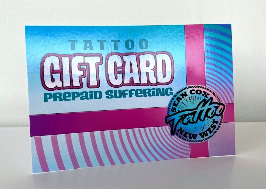 gift-card-tattoo-new-westminster Printed Sean Cox Tattoo gift card standing on white surface