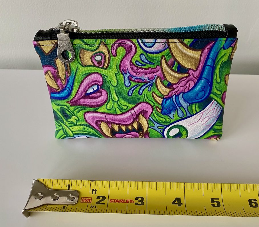 green-monster-stash-bag-tattoo-new-westminster-size Green monster stash bag with measuring tape showing size