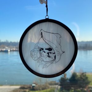 Skull and rose illustration printed on round art glass