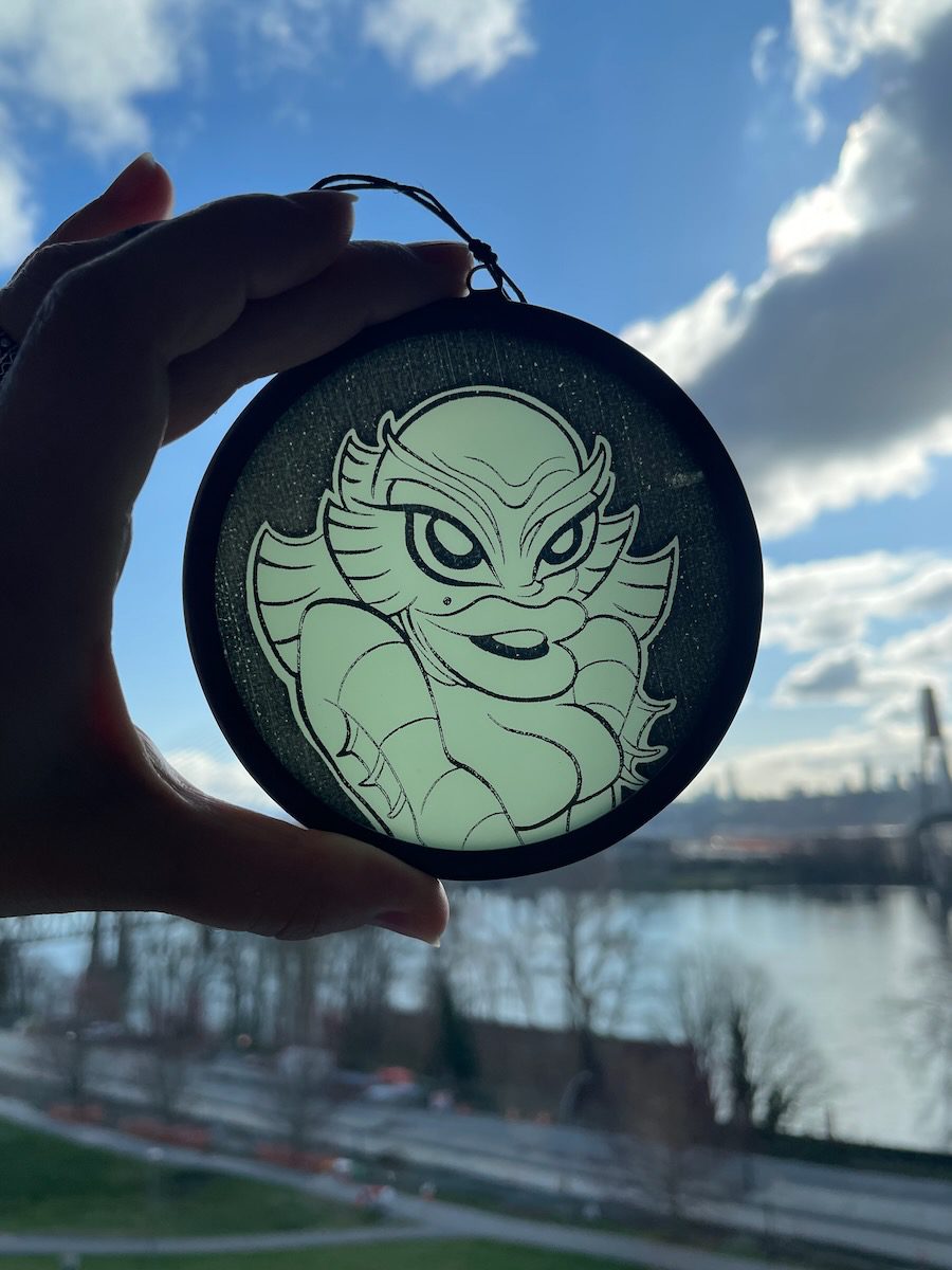 sean-cox-tattoo-glass-art-she-creature-1-front-sky She Creature From The Black Lagoon glass round held to the sky