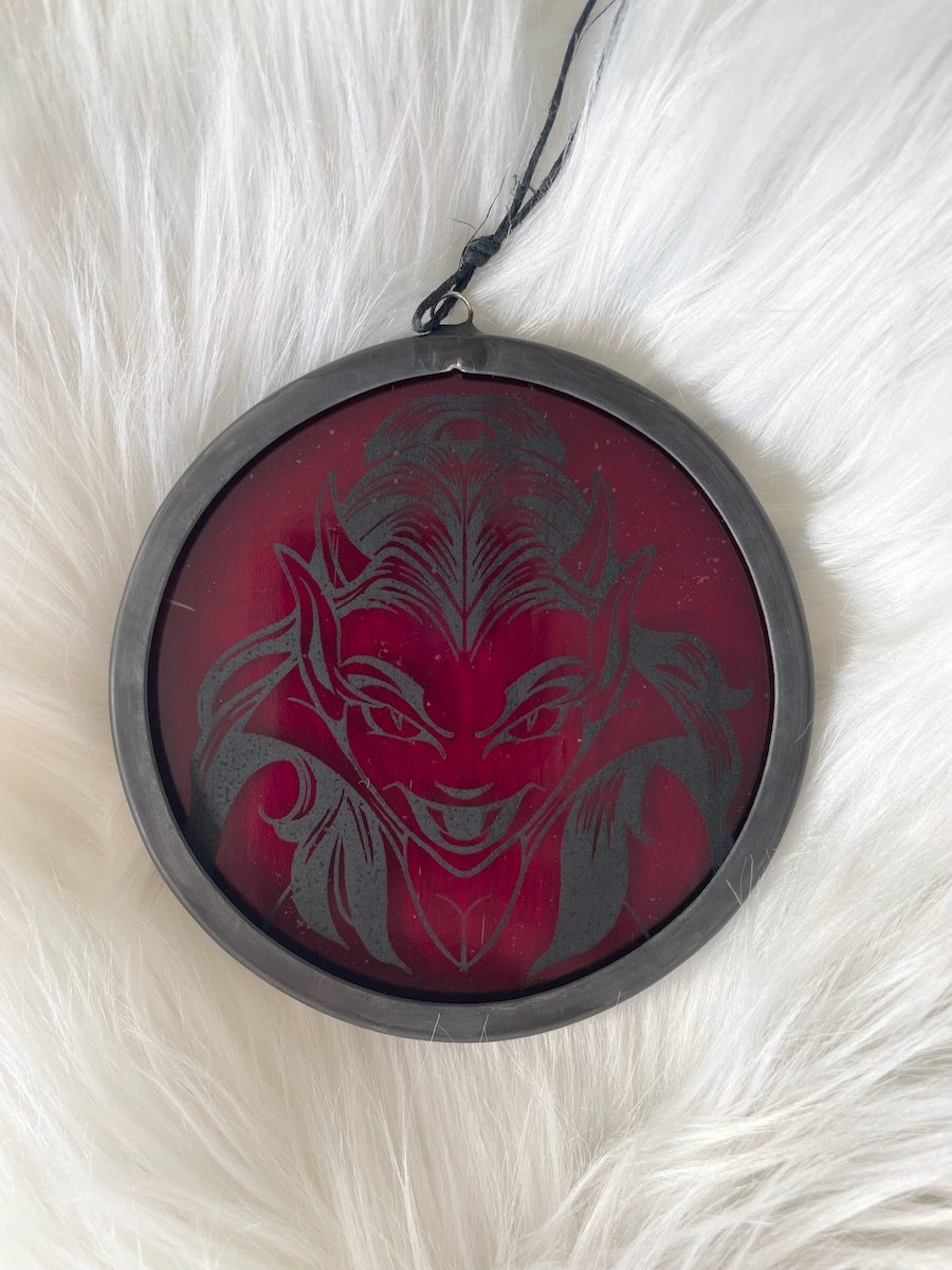 sean-cox-tattoo-glass-art-she-devil-2-front-fur Red devil glass round on fur surface