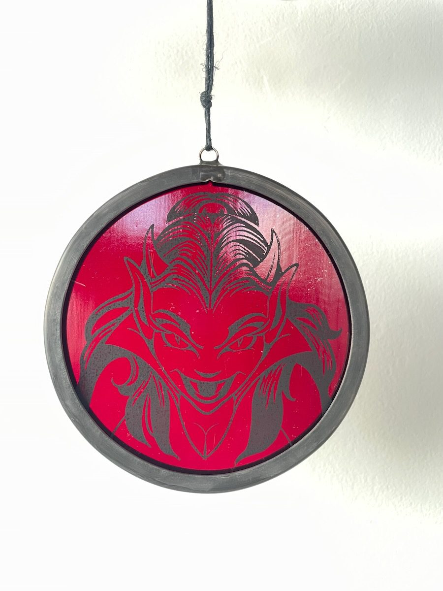sean-cox-tattoo-glass-art-she-devil-2-front-wall Red devil glass round on white wall