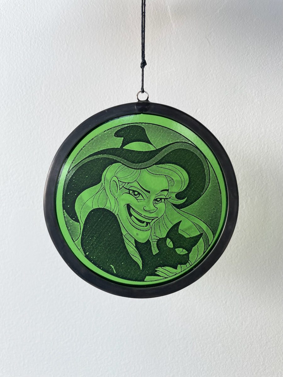 sean-cox-tattoo-glass-art-witch-1-front-wall Green witch glass round on white wall