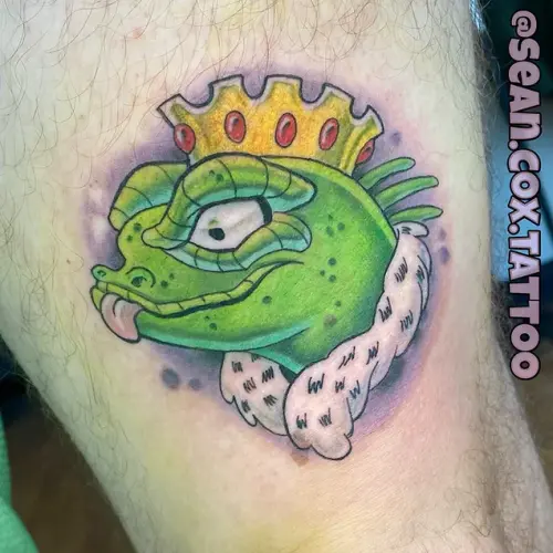 Color cartoon lizard king tattoo by Sean Cox Tattoo, Surrey